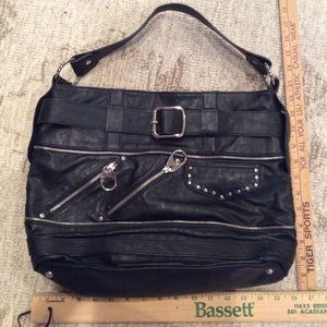 Black leather Carlos Santana purse